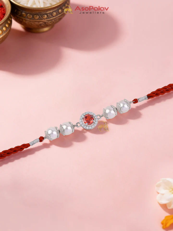 925 Silver Garnet Glow Pearl Rakhi – Elegant Gift for Brother