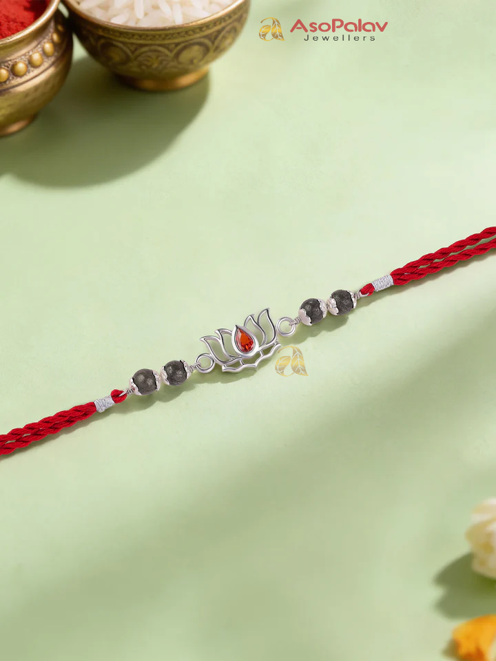 925 Silver Lotus Garnet Rakhi – Elegant Red Stone Rakhi for Brother